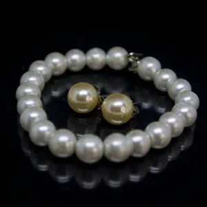 10mm round pearl bracelet with two golden color 13mm pearls